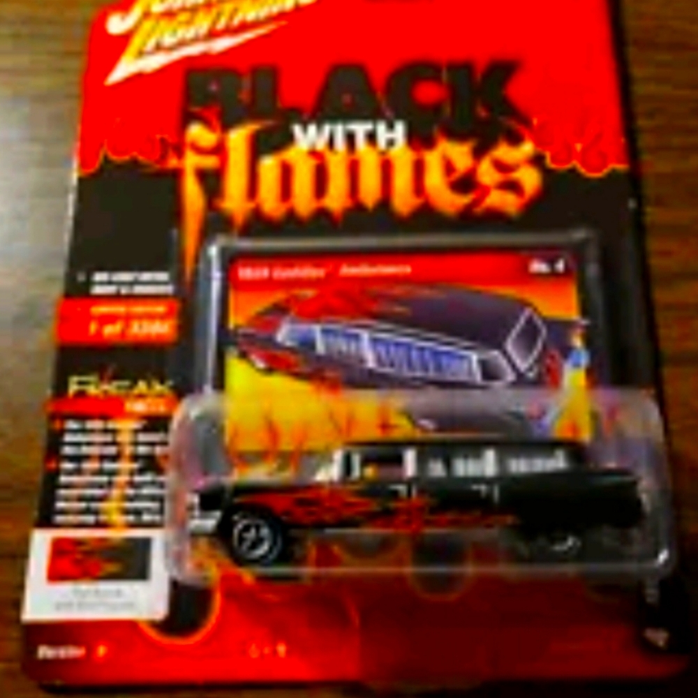 Johnny lightning black with flames 1959 Cadillac Ambulance. Street Freaks.